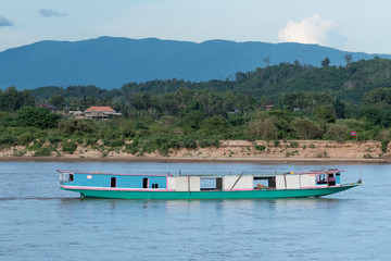 Fototapeta na wymiar Laos transportation boat on Khong river in Golden triangle,Thail
