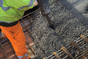 Concreting of slab pouring concrete engineering construction with rebar and formwork