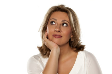 Fototapeta premium beautiful middle aged thoughtful woman