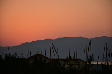 Sunset behind mountain