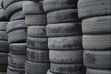old worn out tires heap for recycling or scrap
