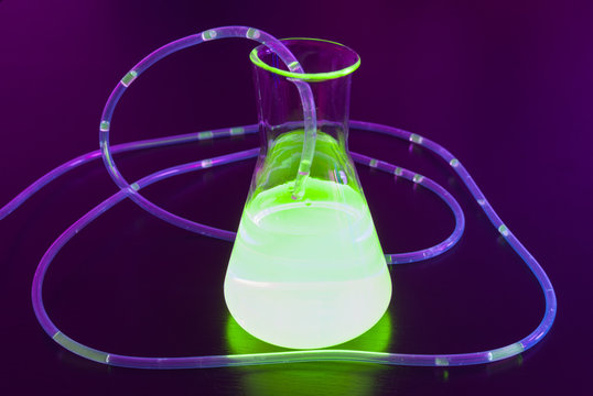 Flask filled with glowing liquid