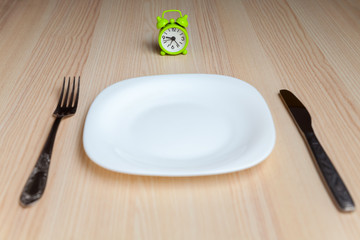 Alarm clock and utensils