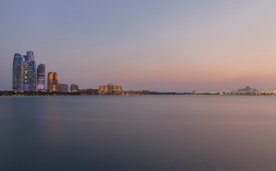 Abu Dhabi cityscape at sunset
