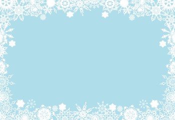 Christmas frame from white snowflakes on a blue background
