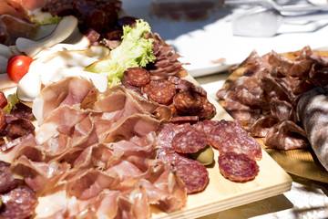 reach of the kitchen of typical Italian cold cuts, pork: salciccia , prosciutto , salami