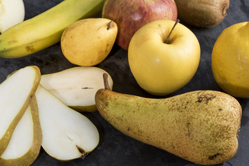 seasonal fruit served on a slate plate. Food and health