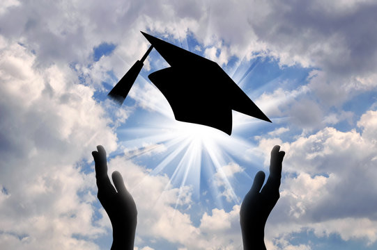 Hands graduate cap throw up in sky