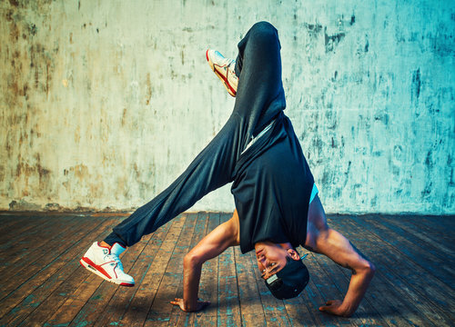 Young man break dancing