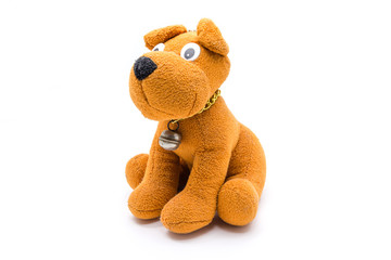 Cute dog brown doll/toy isolated on a white background