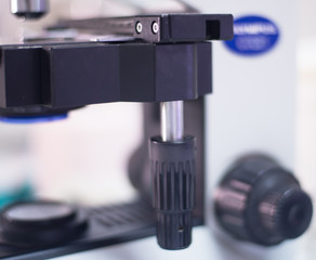 Laboratory Microscope. Scientific research background.white tone