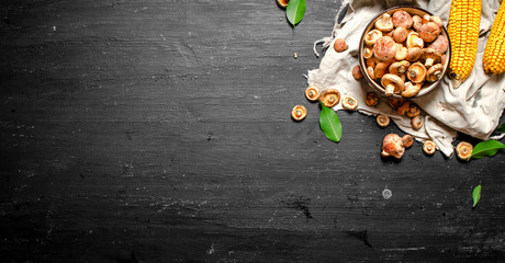 Fresh raw mushrooms with corn and garlic.