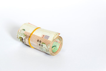 A row of Thailand's Baht isolated on white background.
