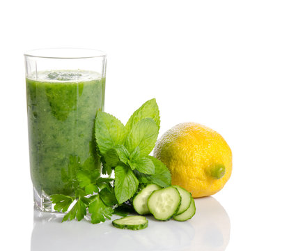 Green smoothie with cucumber,  mint, parsley and lemon as health