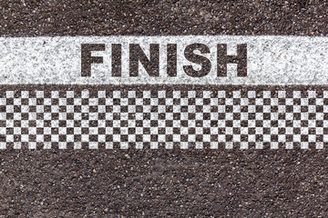 word finish in  line and checked pattern on asphalt texture