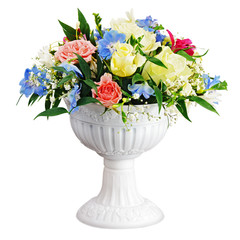 Colorful flower bouquet arrangement centerpiece in vase isolated on white background. Closeup.