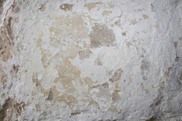Old distressed concrete stone wall