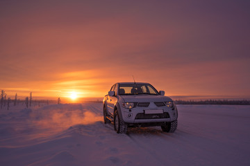 Fototapeta na wymiar car on the winter road