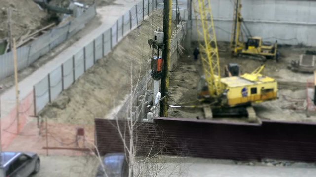 hammering concrete pile at construction site. Timelapse
