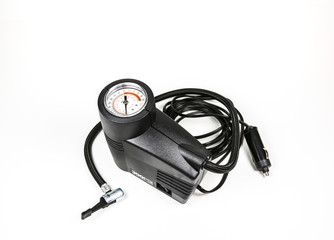 a compact inflation machine with gauge number on white background.