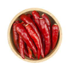 red chili pepper in bowl isolated on a white background