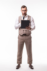 The Showman interviewer with blank. Young elegant man holding microphone against white background.Showman concept.