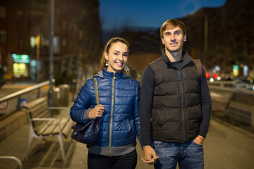 Family couple having a city walk