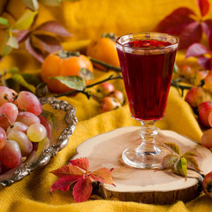 Brandy vintage glass. Autumn composition.