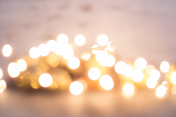 Abstract christmas decorations and lights on the background. Defocused image.
