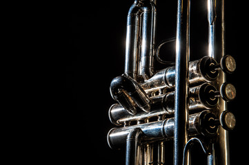 trumpet, wind instrument / lonely musical instrument which is a trumpet on a black background
