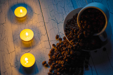 Mug with coffee beans.