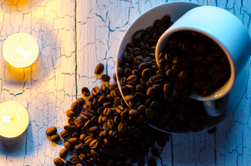 Mug with coffee beans.