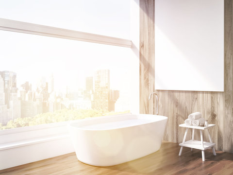 Sunlit bath tub and panoramic window