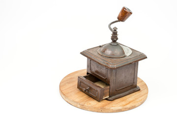Old rustic wooden hand mill for coffee and spices
