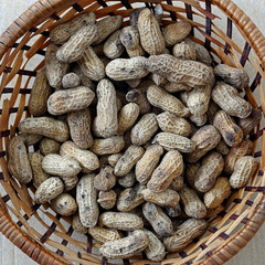 Raw Peanuts in Rattan Container