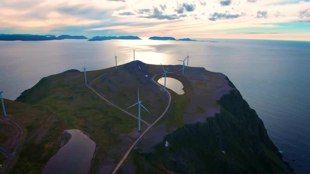 Windmills for electric power production. Arctic View Havoygavelen windmill park, Havoysund, Northern Norway Aerial footage.