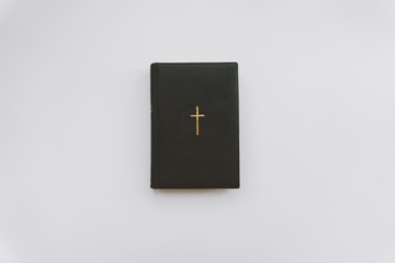 Catholic book with a gold cross, a Catholic book with gold pages