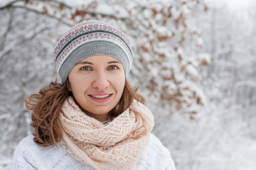 Attractive young woman in wintertime outdoor