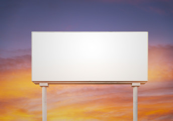 Obraz premium blank white billboard for outdoor advertising at sunset,ready for product display montage.