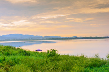 Pond and mountain background