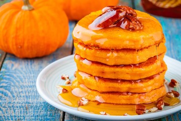 Pumpkin pancakes with honey and pecan