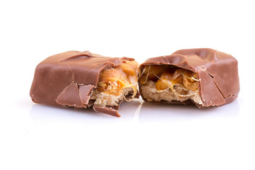 Chocolate bar with caramel on white