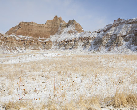 Winter Badlands Grass And Mountains.