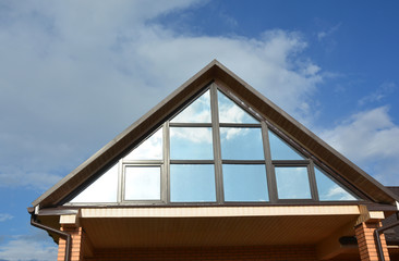 Attic Construction with beautiful skylights, roof windows.