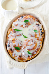 Cinnabon with cottage cheese, raisins and cinnamon in the glaze