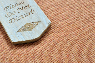 Do not disturb wooden sign with space