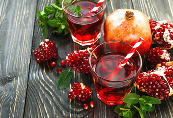 Pomegranate juice with fresh fruits and mint