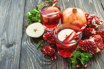 Sangria with apples, pomegranate, mint and cinnamon