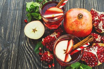 Sangria with apples, pomegranate, mint and cinnamon