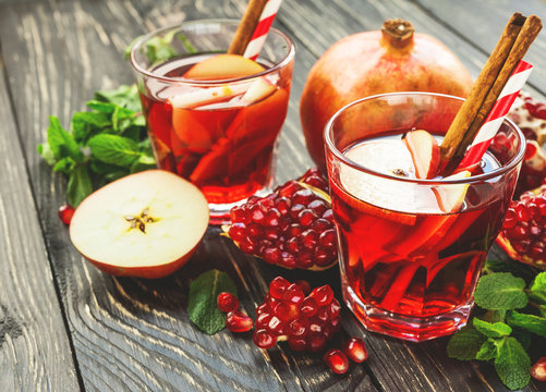 Sangria with apples, pomegranate, mint and cinnamon